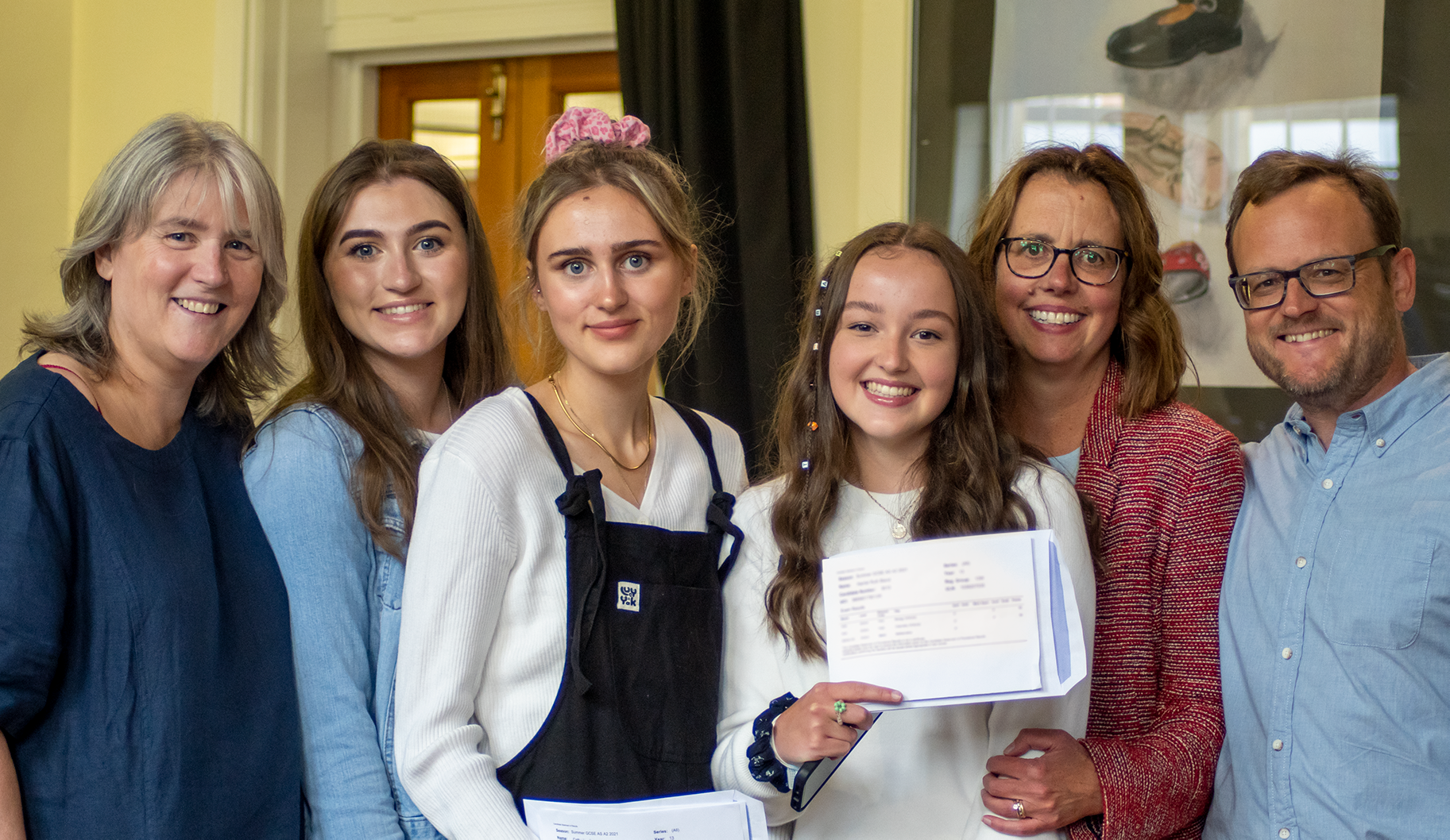 The Bland and Cooney families celebrating their daughters' results - Catherine Cooney is studying Marketing at Bristol, and Harriet Bland is studying Medicine at Oxford