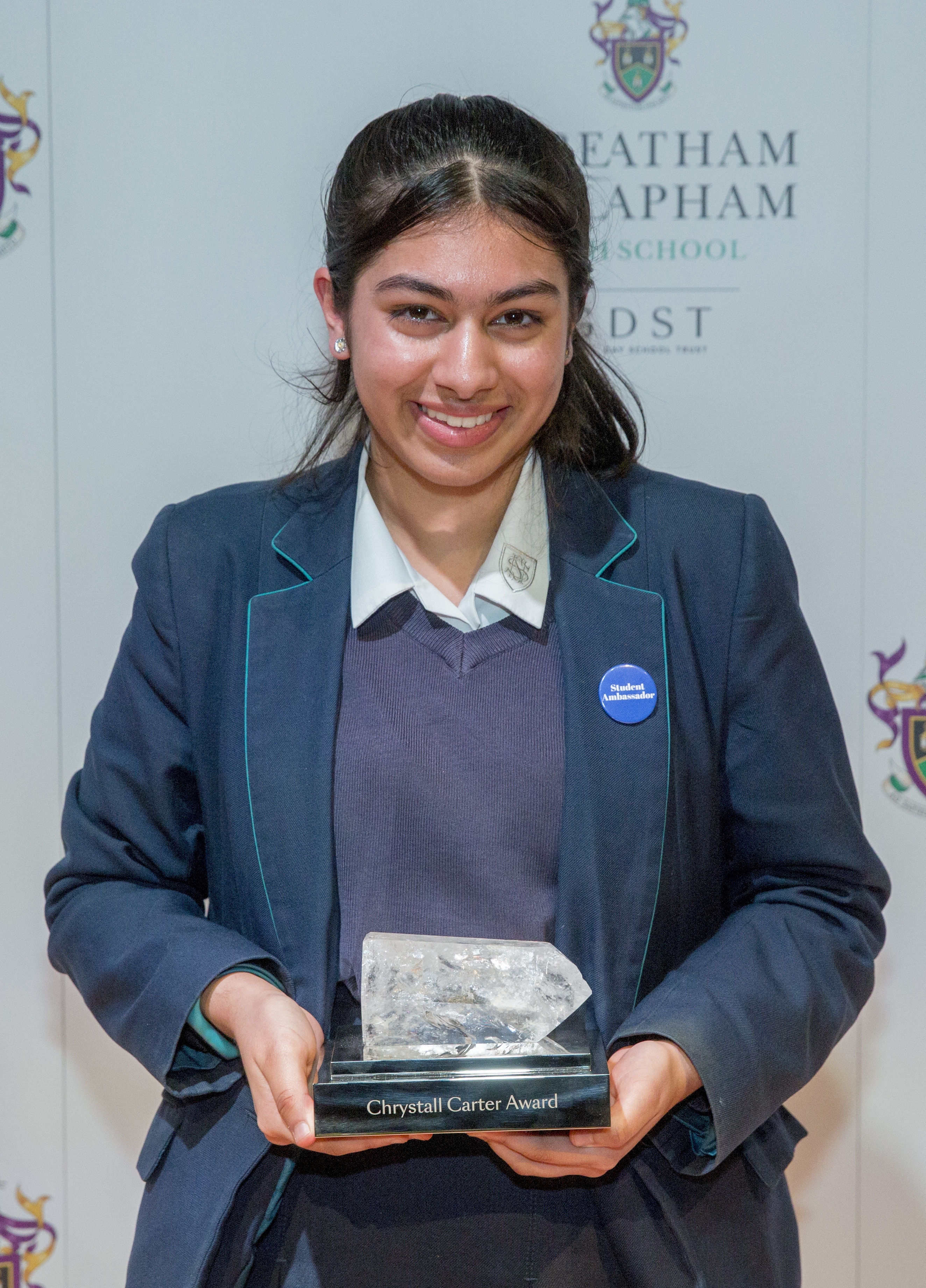 suhani holding chrystall prize